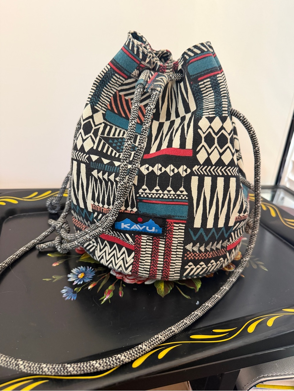 Kavu Patterned Drawstring Mini Bucket Bag in Teal, Black & Cream